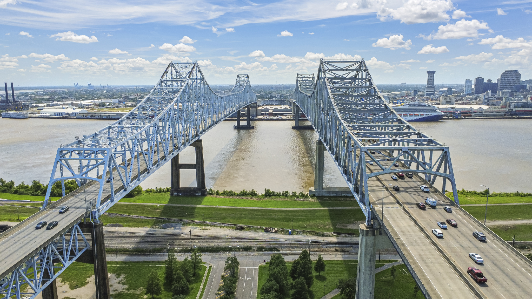 Aerial view of the Mississippi River bridge and New Orleans skyline